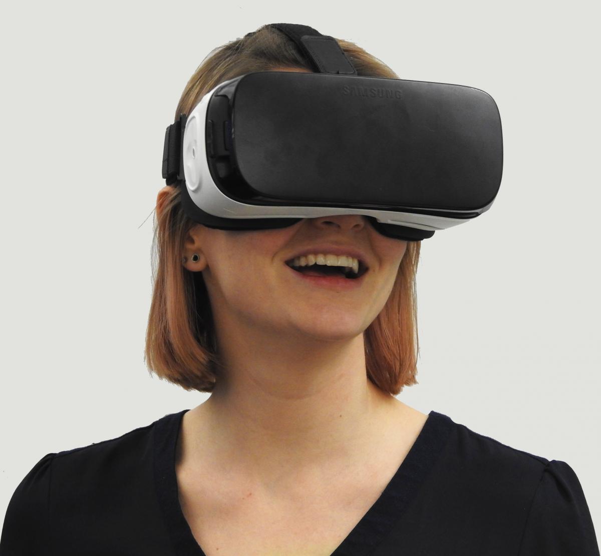 wearing virtual reality headset being worn by a woman
